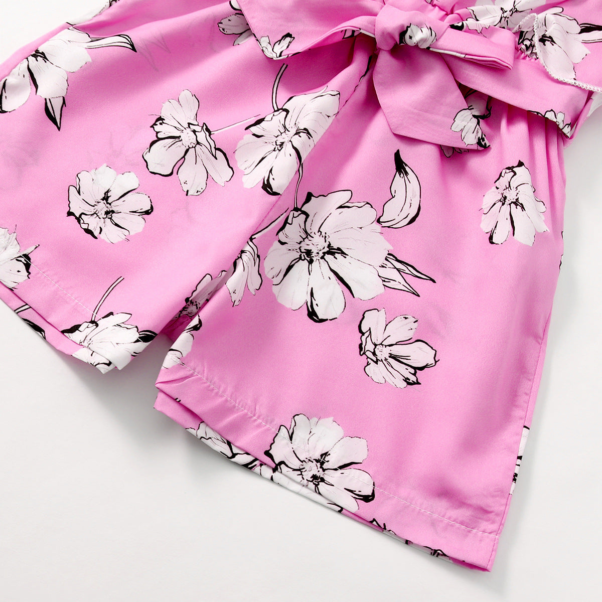 The Tropical Trendsetter | Girls' Floral Short-Sleeved Woven Jumpsuit